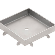 Polished stainless steel square drain cover with center opening and four feet, shown at an angle.