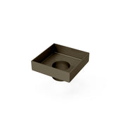Square oil rubbed bronze center drain with shallow basin and circular drain opening.