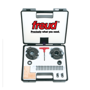 Freud RS2000 door system kit containing two head assemblies, red T-handle wrench, screws, shims, and metal brackets in carryi