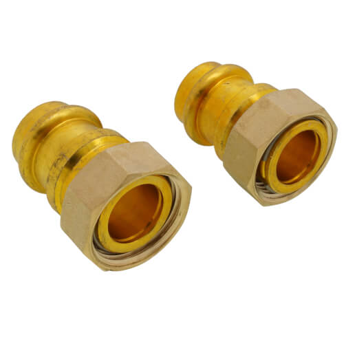 Two brass union FNPT press fittings with yellow compression rings and tan hexagonal nuts.
