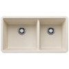 Two-bowl undermount kitchen sink in soft white composite material with drain fittings.