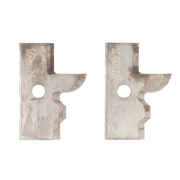 Two metal profile knife blades with curved edges and center holes, stamped with Freud branding.