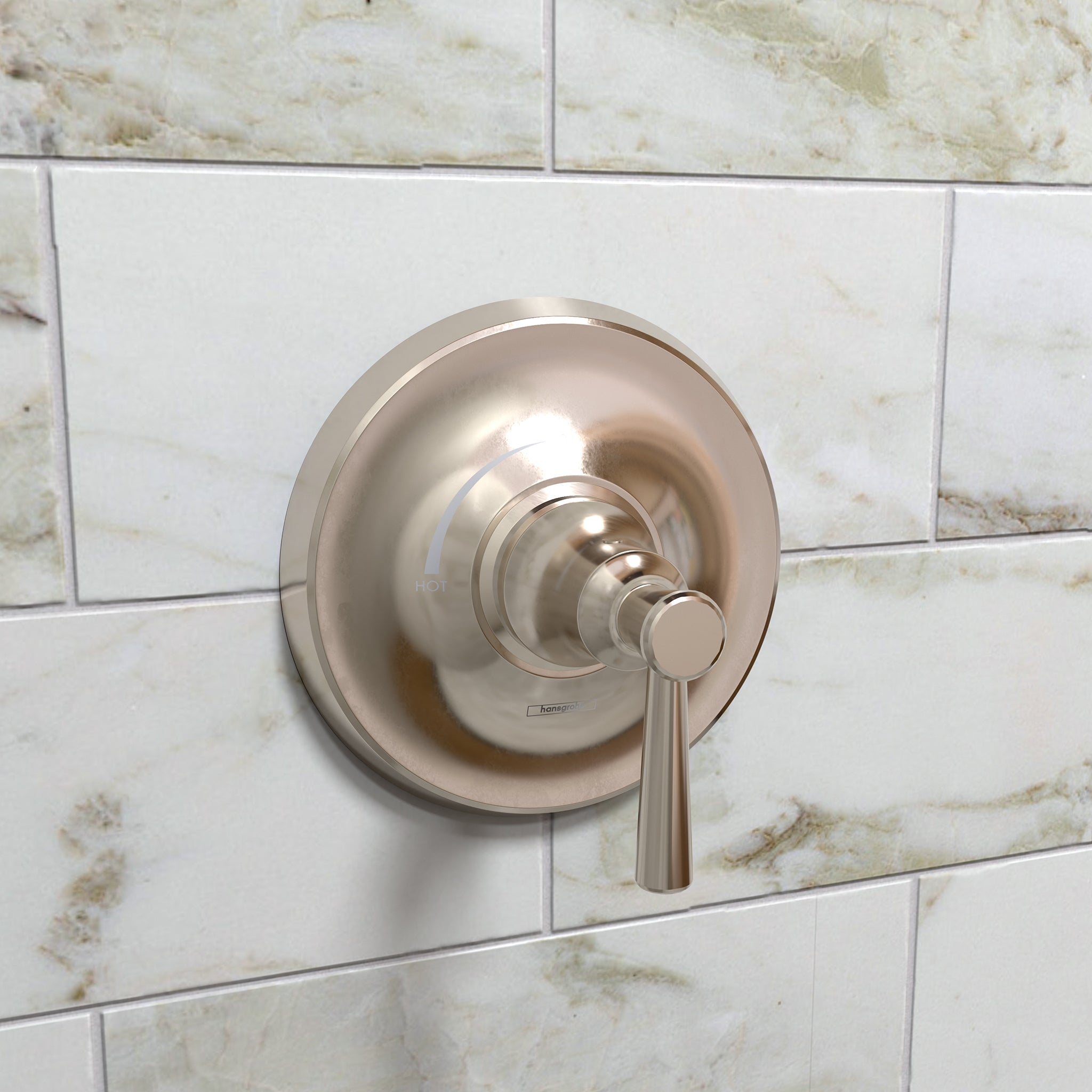 Polished nickel pressure balance shower trim with circular escutcheon and lever handle mounted on marble tile wall.