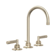 Satin nickel three-hole bathroom faucet with curved C-spout and lever handles on round bases.