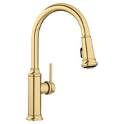 Satin gold pull-down kitchen faucet with high arched spout and single lever handle.