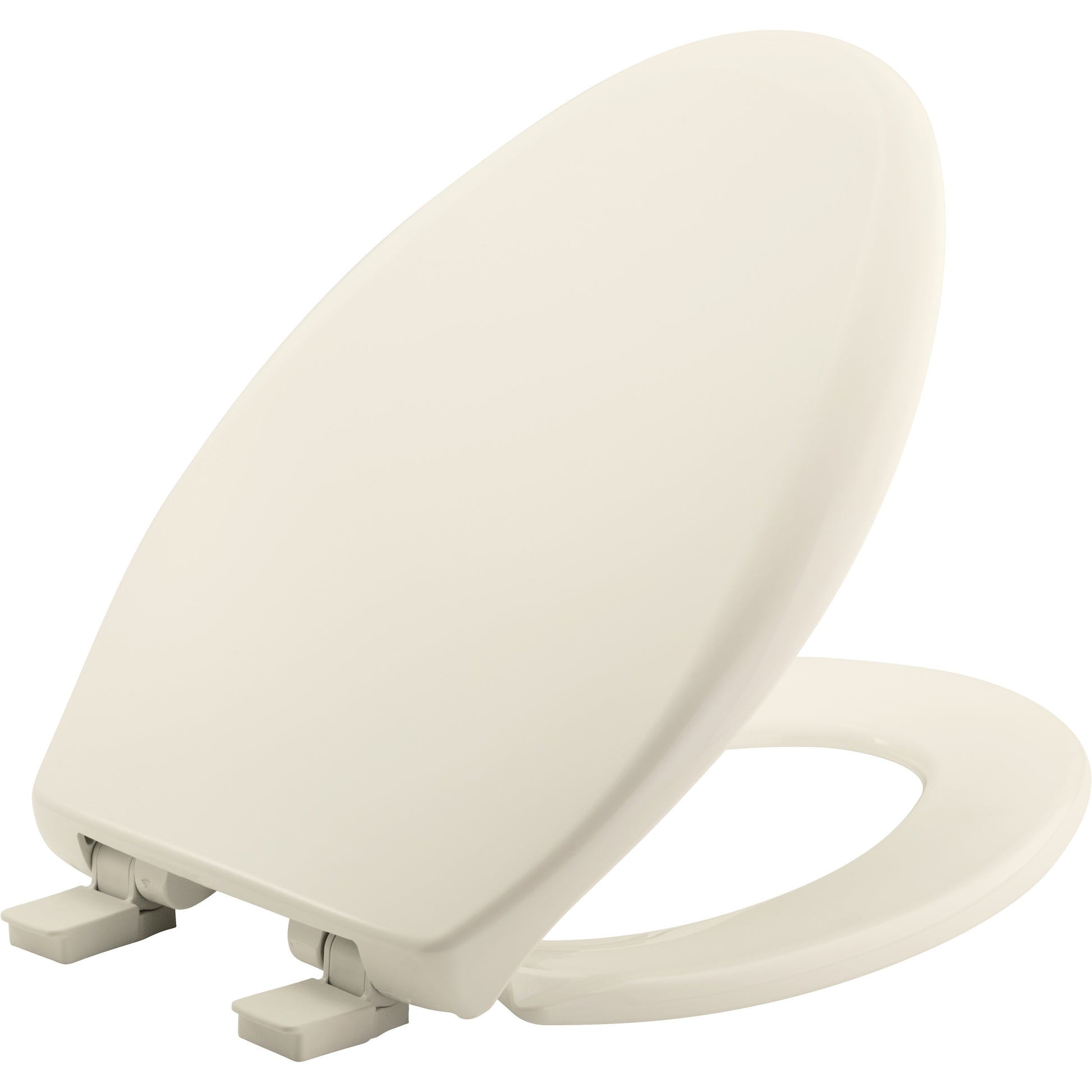 Biscuit-colored elongated plastic toilet seat with closed lid, hinges, and rubber bumpers visible at base.
