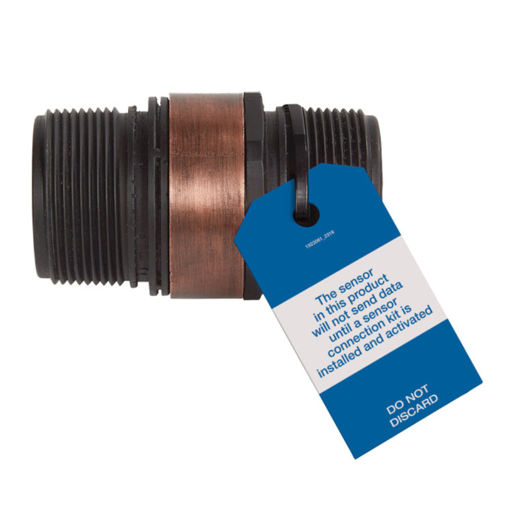 Iron boiler pressure relief valve with threaded outlets and attached blue sensor tag.