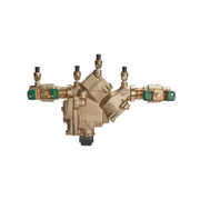 Bronze backflow preventer with four ports, green shut-off valves on sides, and black test cocks on top and bottom.