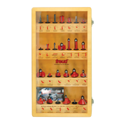Freud 26-piece router bit set displayed in wooden storage case with red and black bits organized in rows.