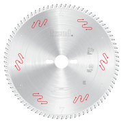 Circular saw blade with carbide-tipped teeth around edge, central arbor hole, and anti-vibration markings in red.