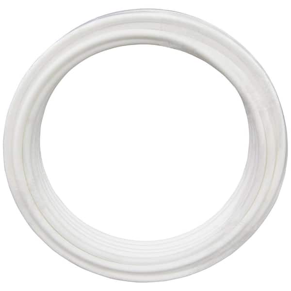 White polyethylene tubing coiled in a ring shape against white background.