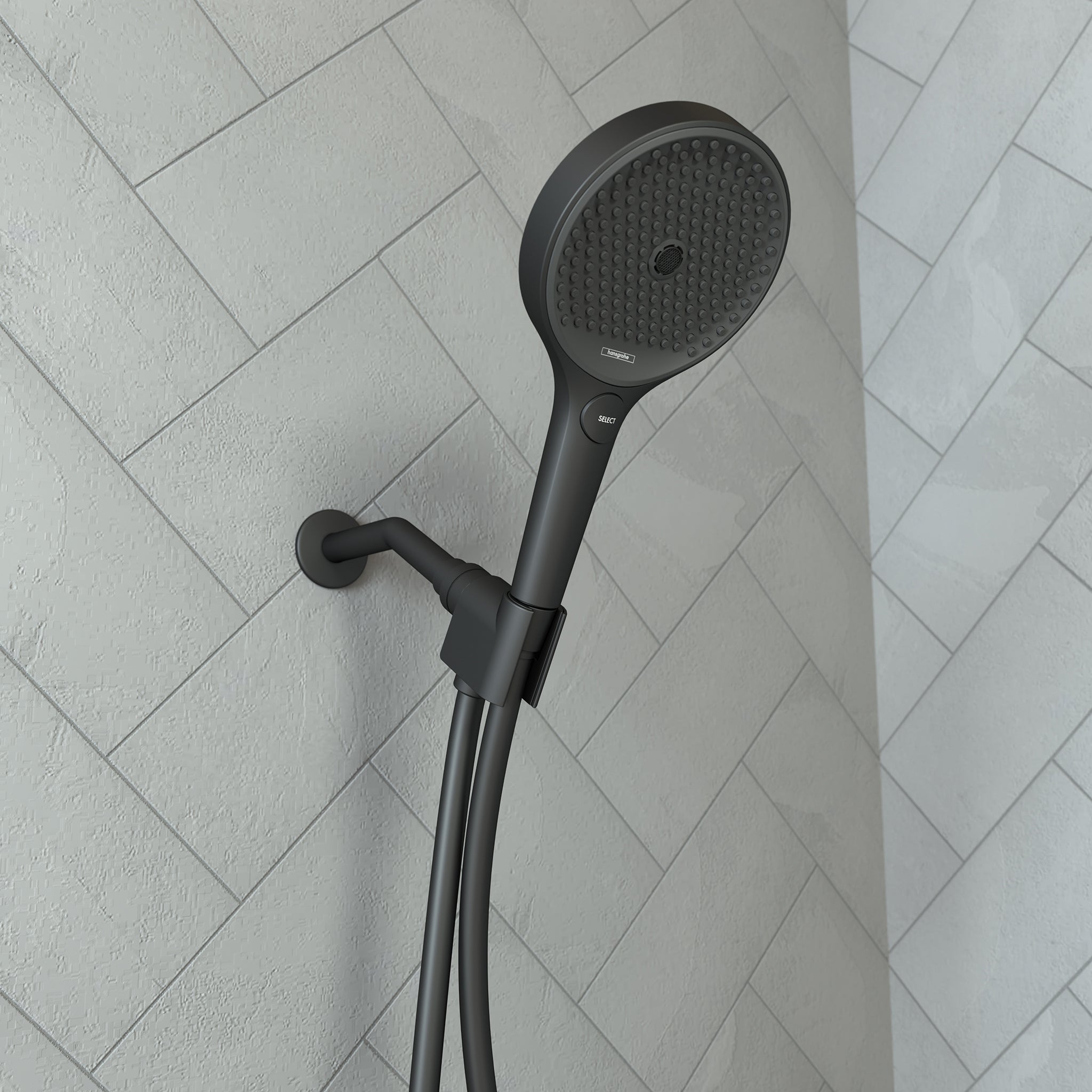 Matte black handheld showerhead with textured round face mounted on adjustable wall bracket with hose.
