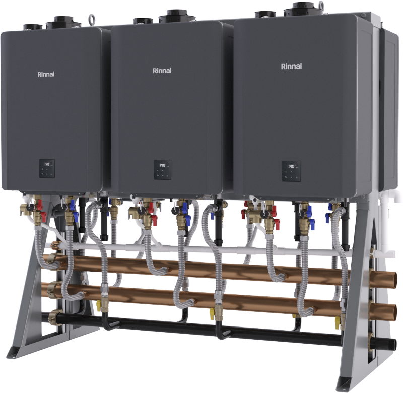 Three dark gray Rinnai tankless water heaters mounted on a metal rack frame with copper piping and colored connection lines.