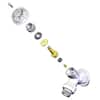Chrome freezeless wall faucet repair kit with components laid out in a line including metal fittings and washers.