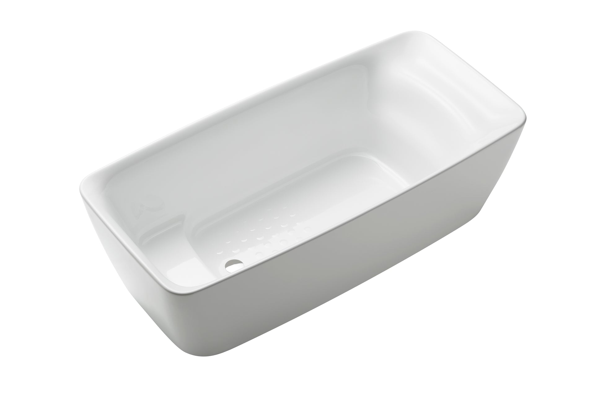 White freestanding soaker bathtub with curved sides and sloped interior for reclining.