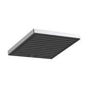 Chrome and black square shower head with horizontal slot pattern on underside.
