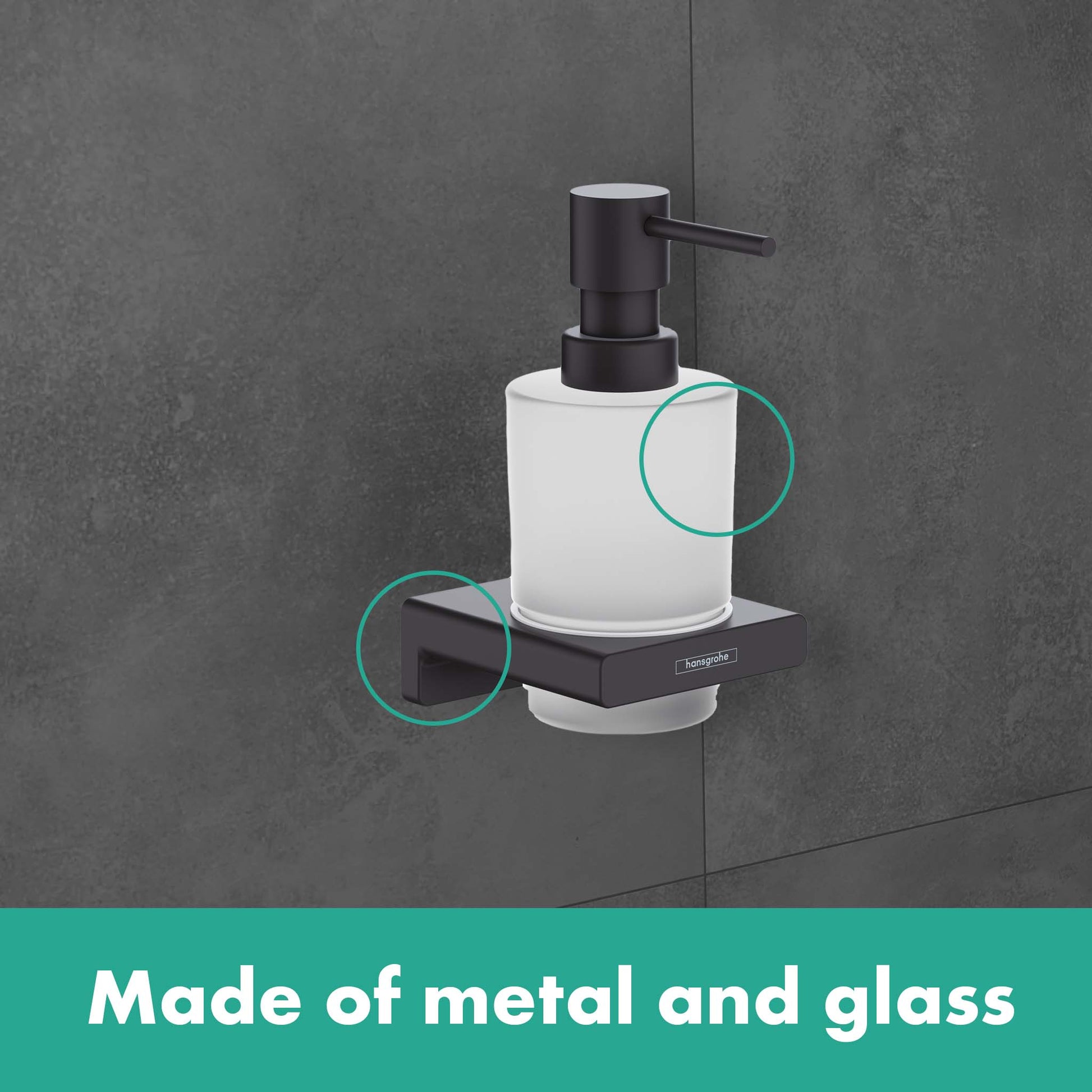 Brushed black chrome soap dispenser with white glass reservoir and lever pump mounted on tile wall.