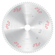 Circular saw blade with silver carbide-tipped teeth around perimeter, central arbor hole, and red markings on face.