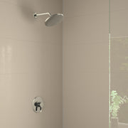 Chrome shower set with round rainfall showerhead and wall-mounted pressure balance valve with lever handle.