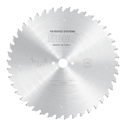 Circular carbide-tipped saw blade with gray teeth around perimeter, center hole, and "Freud" branding, made in Italy.