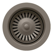 Volcano gray metal basket strainer with circular perforated basin and center post, viewed from above.