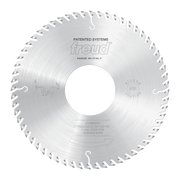 Silver circular saw blade with multiple teeth around perimeter, large center hole, and Freud branding, made in Italy.