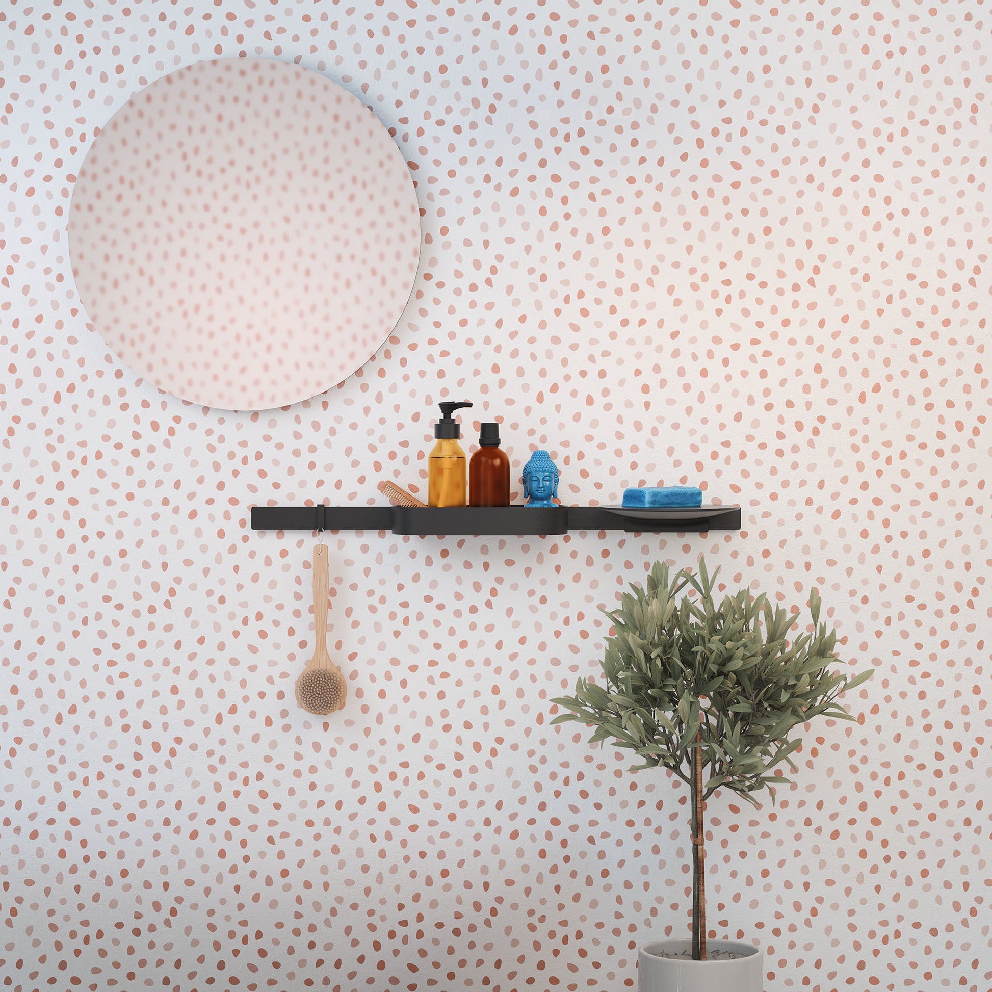 Matte black wall-mounted shelf holding bathroom bottles and soap, above potted plant and circular mirror.