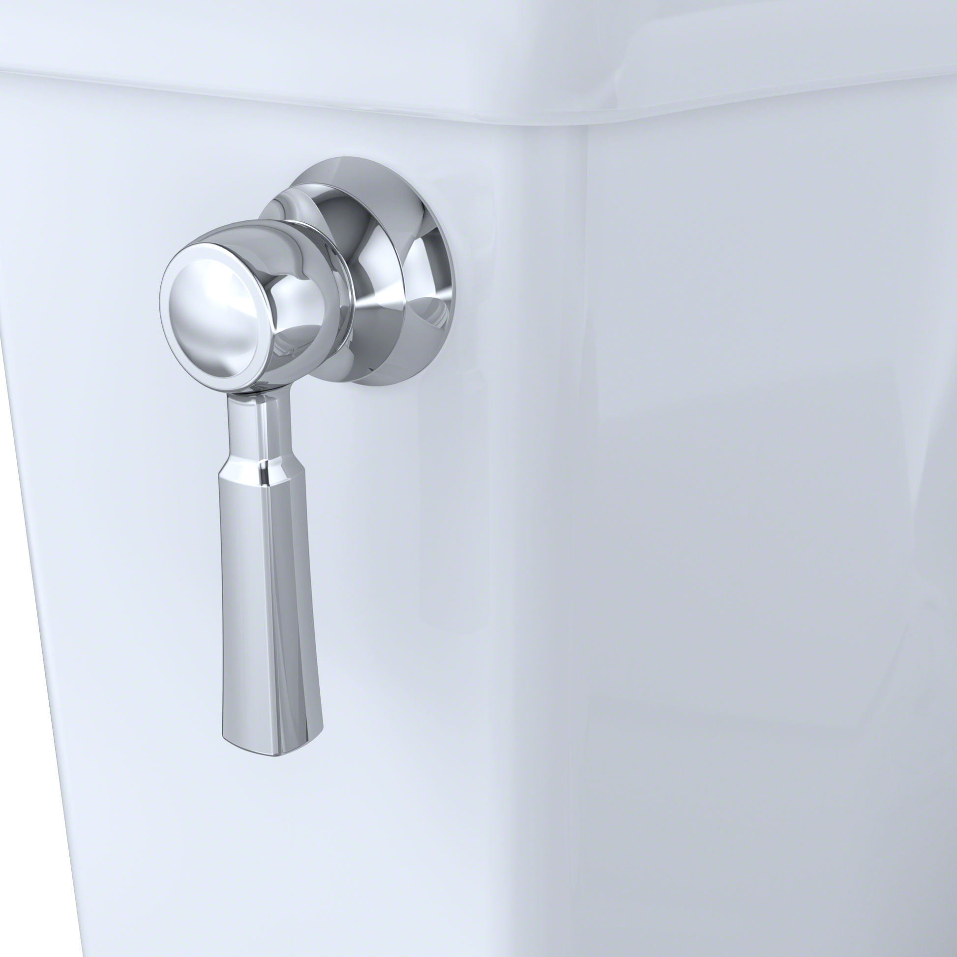 Chrome finish trip lever handle mounted on white toilet tank.