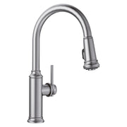 Stainless steel pull-down kitchen faucet with curved spout and single lever handle.