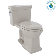 Bone-colored one-piece elongated toilet with soft-close seat and matching tank, viewed from the side angle.