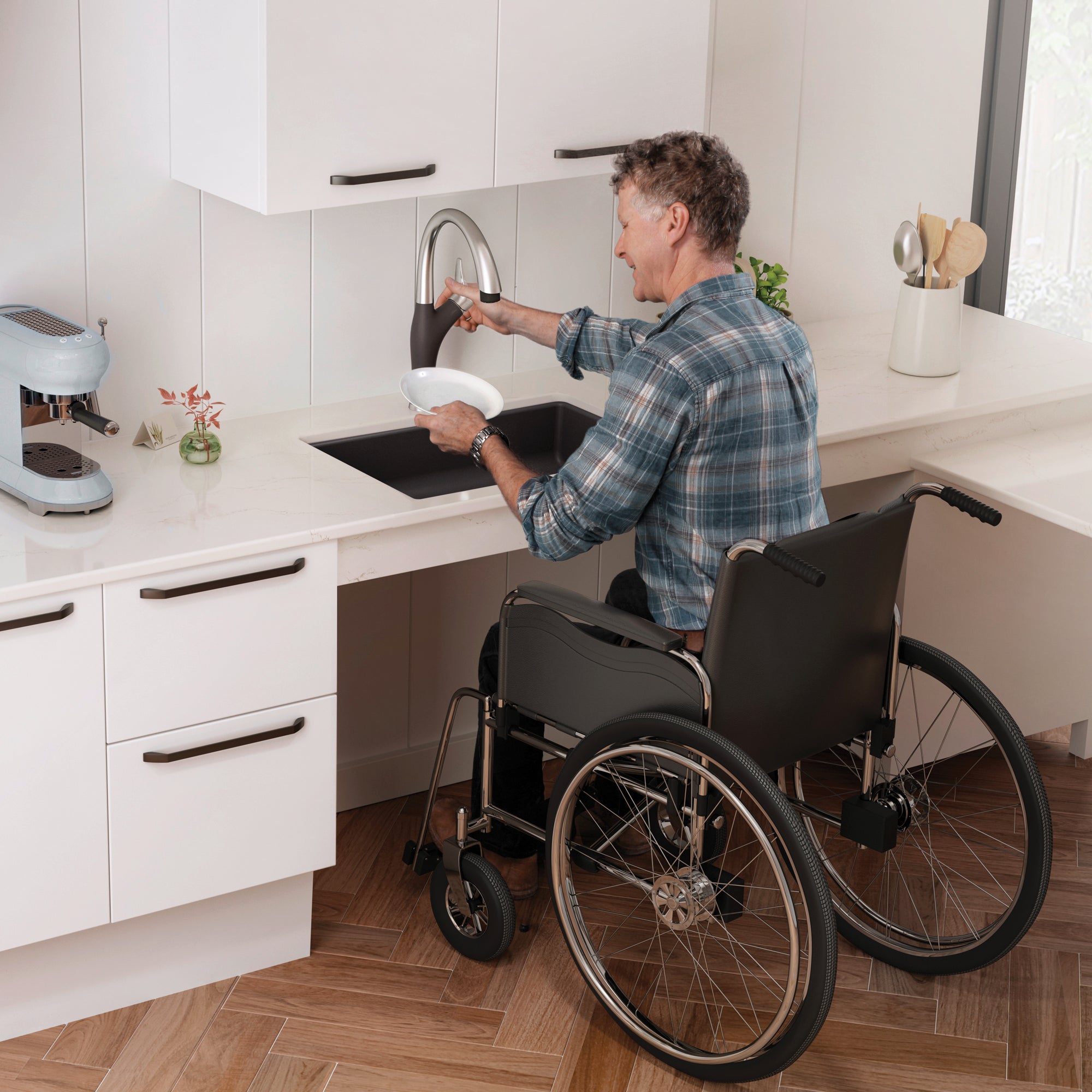Black undermount kitchen sink with arc faucet installed under white cabinetry, shown in accessible height configuration.