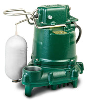 Green cast iron sump pump with white float switch connected by metal arm to white cylindrical float.