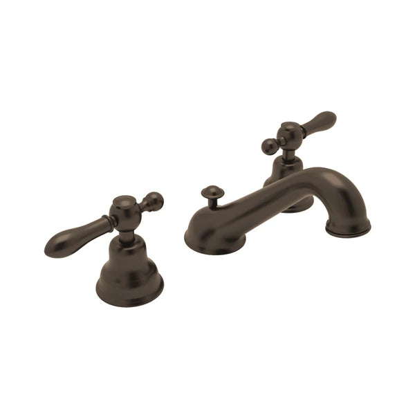Three-piece widespread bathroom faucet in tuscan brass with lever handles and curved C-spout.