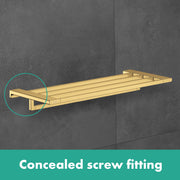 Chrome towel rack with horizontal bar mounted on gray tile wall.