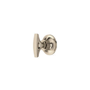 Satin nickel rectangular trim plate with circular mounting base and central control knob for volume and diverter functions.