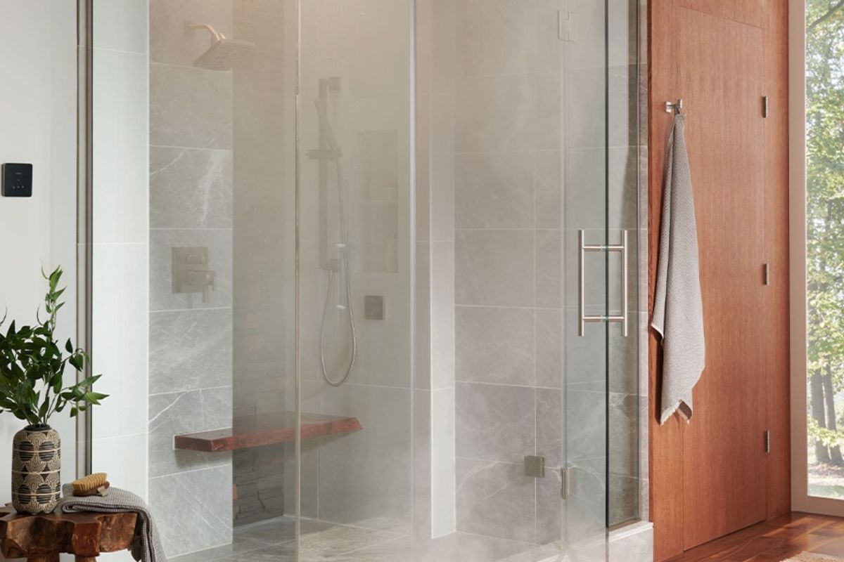Brizo Mystic 7.5kW Steam Generator and Brizo Round Steam Set A bathroom with a steam shower system installed that fills the shower with relaxing steam for a spa-like experience