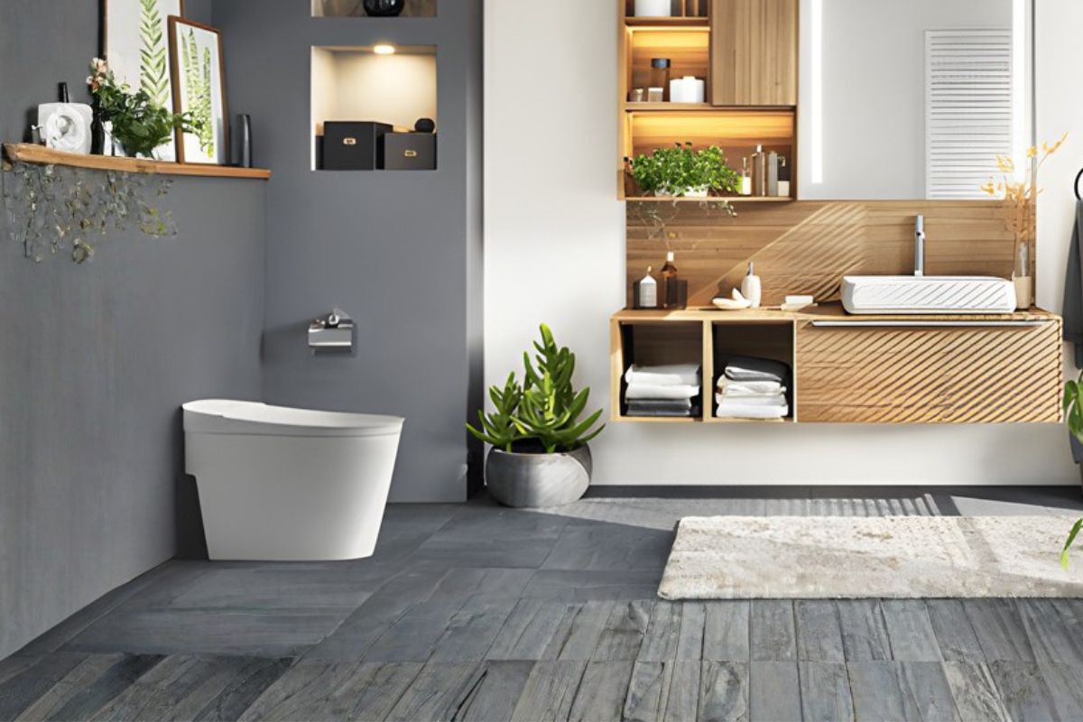 Studiolux SLi1010 1-Piece Tankless ADA Toilet White A modern bathroom with the Studiolux SLi1010 1-Piece Tankless ADA Toilet White standing out against the grey wall