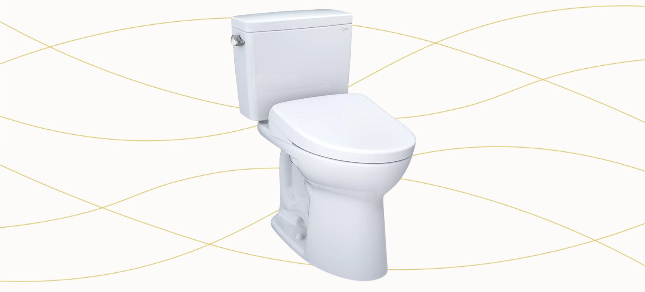 The TOTO Drake two-piece, elongated toilet on a plain background with the lid closed